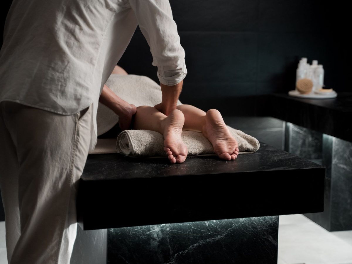 Treatment room at Tāhuna Spa with a view of the mountains